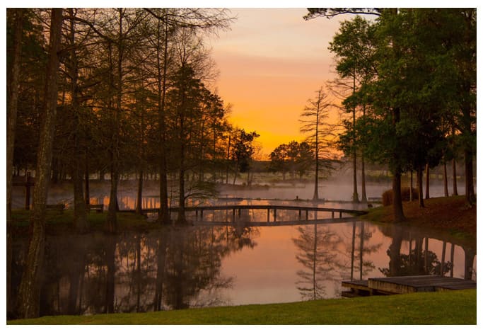 Sunset over the lake at Cypress Lake Recovery
