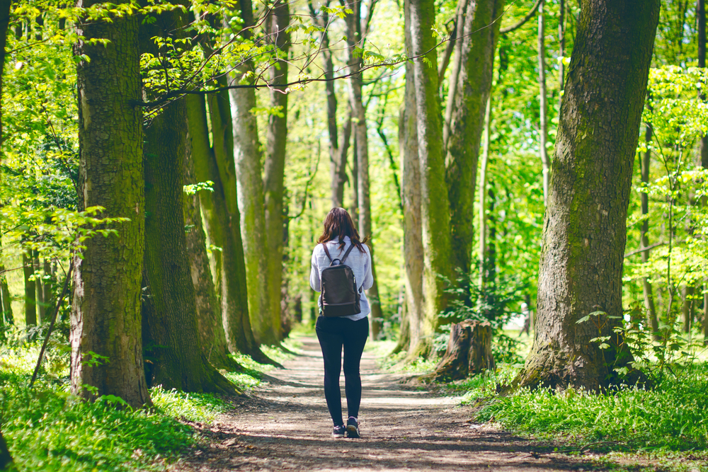 woman practicing mindfulness in nature