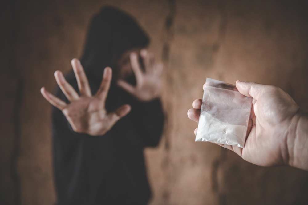 man trying to stop his heroin addiction by saying no