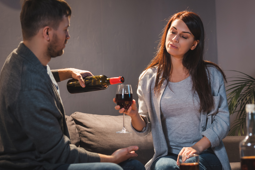 husband manipulated by his addicted wife to give her a few more wine