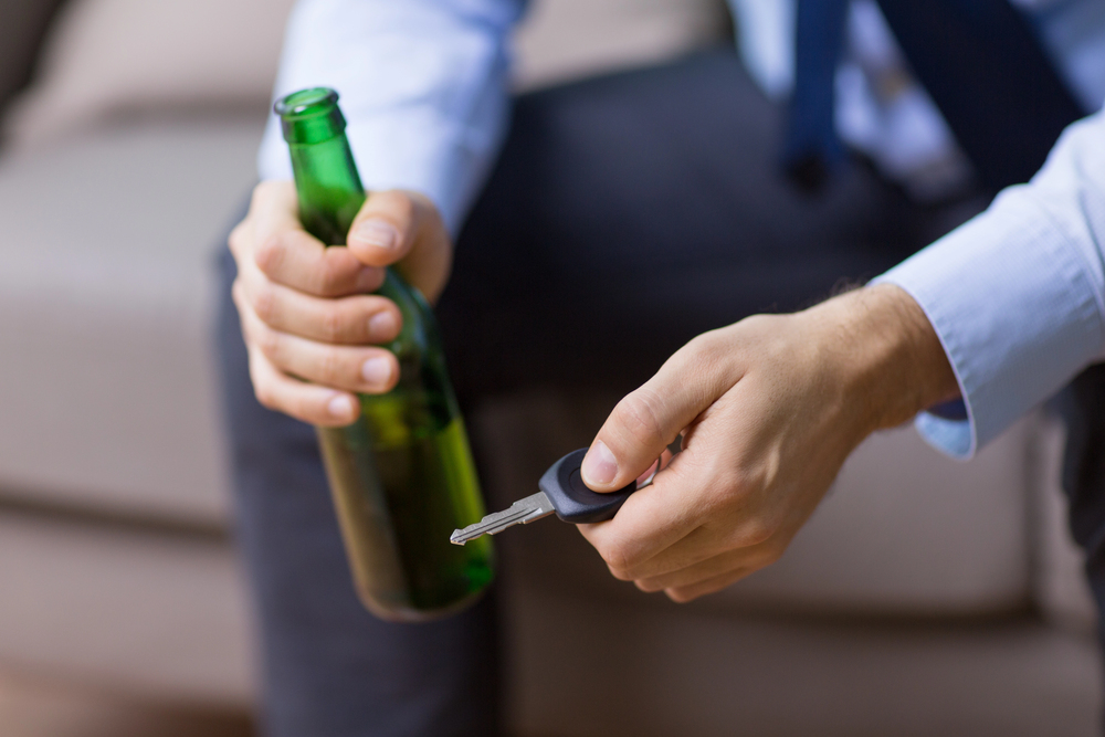 man thinking in drinking and driving