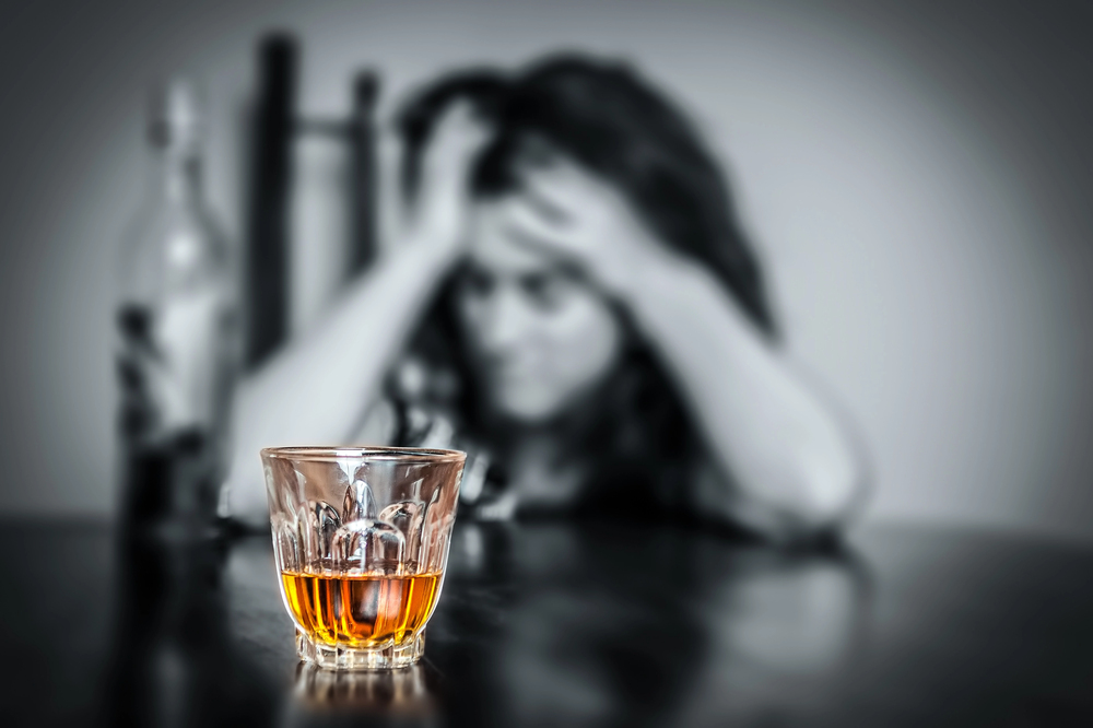 woman who have heroin and alcohol addiction
