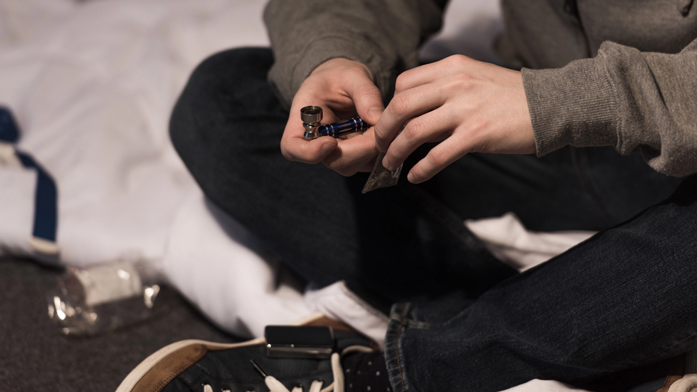 man smoking tobacco using some vape ecigs