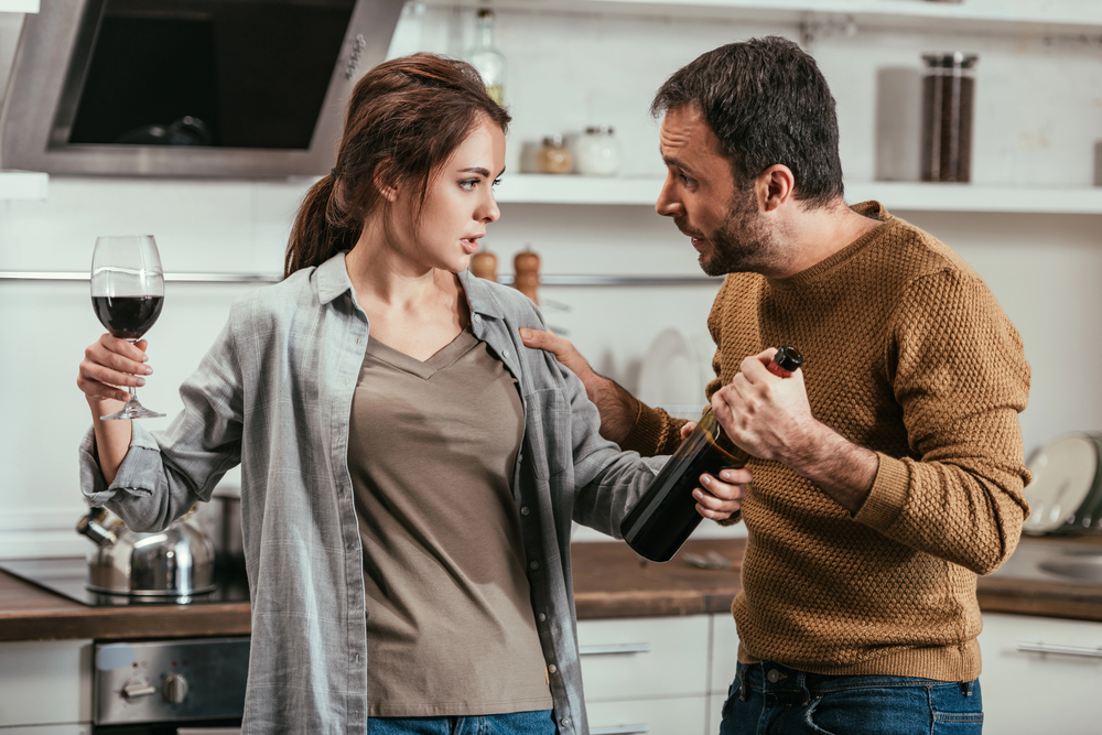 spouses fighter over getting an alcoholic drink