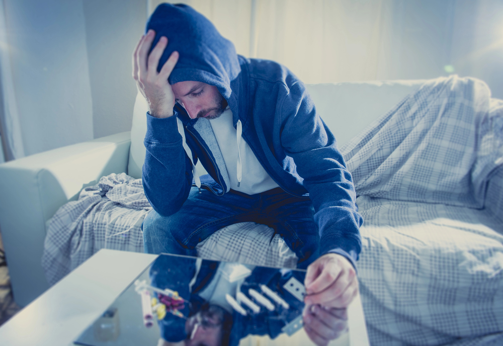man spiraling out of life because of drug addiction