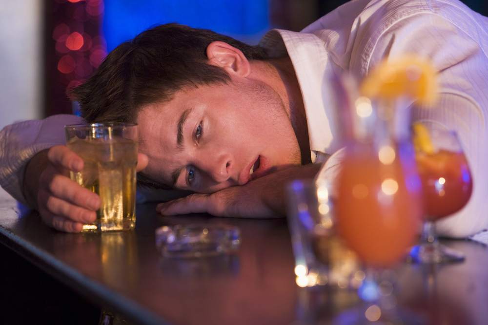 man pass out and intoxicated possible alcohol poisoning or overdose