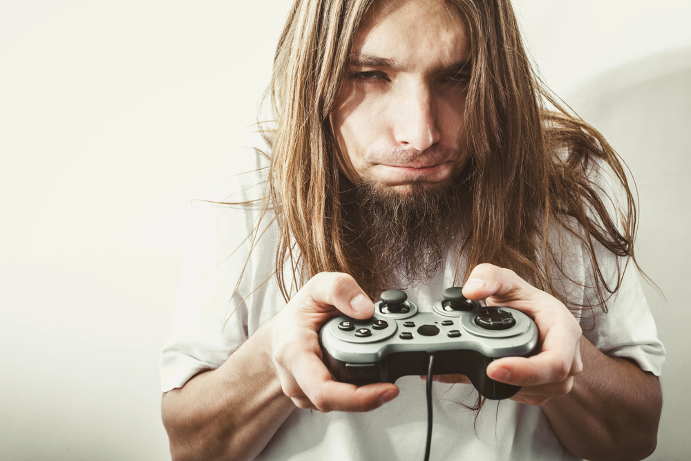 man showing signs of gaming addiction