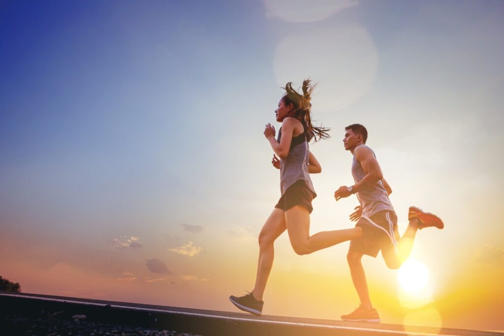 Couple jogging together during an outdoor workout