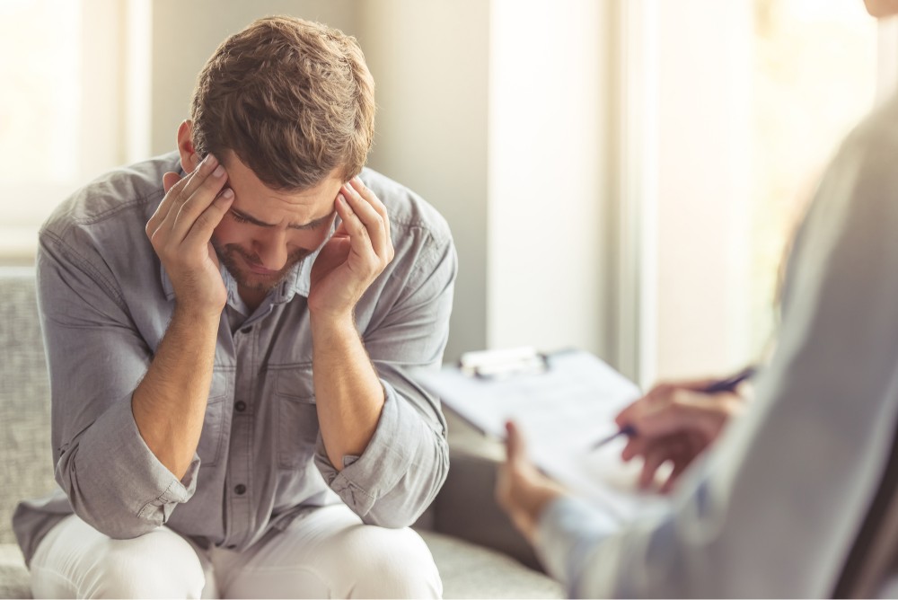 a depress person with  psychiatrist