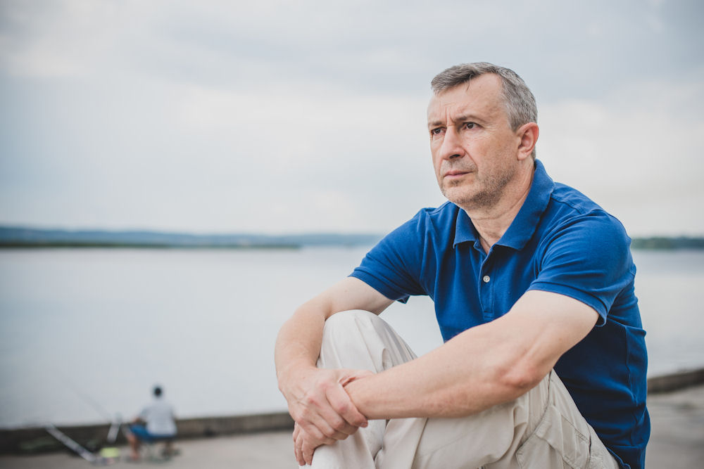 Worried veteran man facing alcoholism