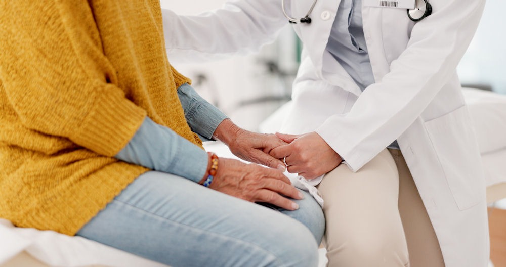 Doctor reassuring woman going through PAWS