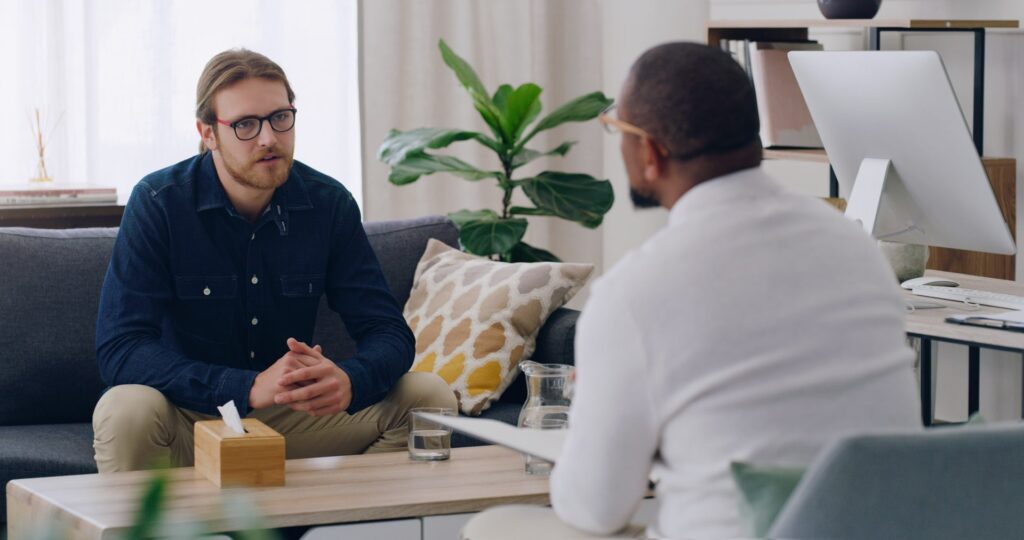 a man talking to a health expert about benzo withdrawal